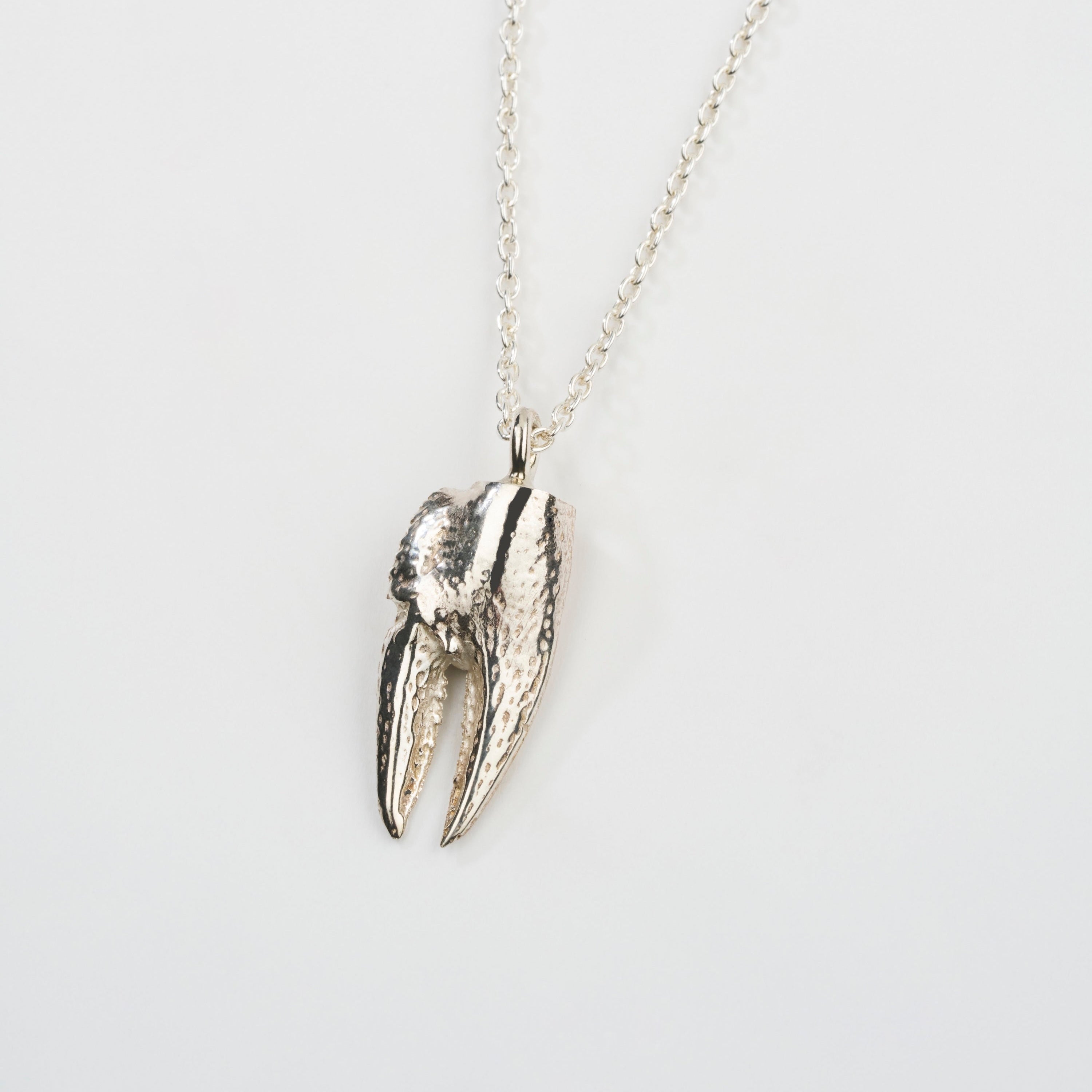 Pendentif pince à crabe