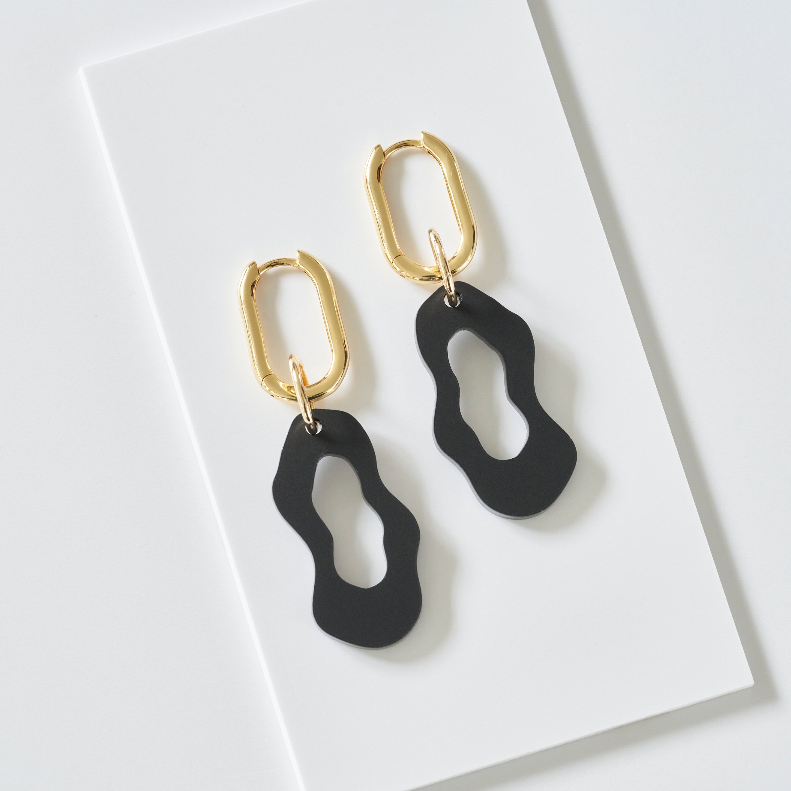 Gigi - frosted black with gold-plated hoops